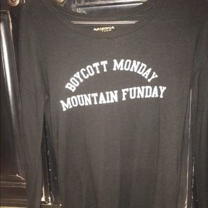 Black sweater with no hoodie.